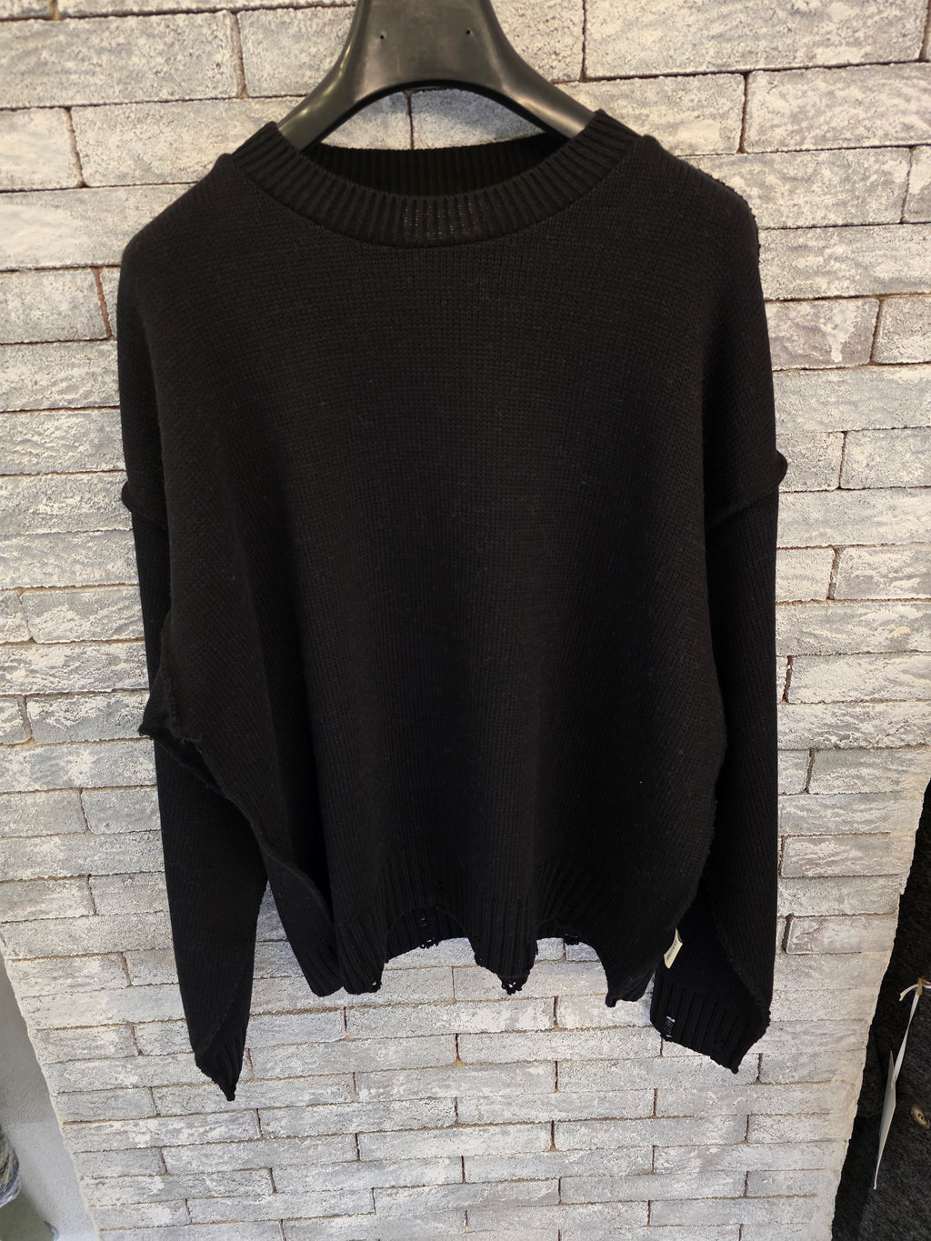 Maglione con rotture