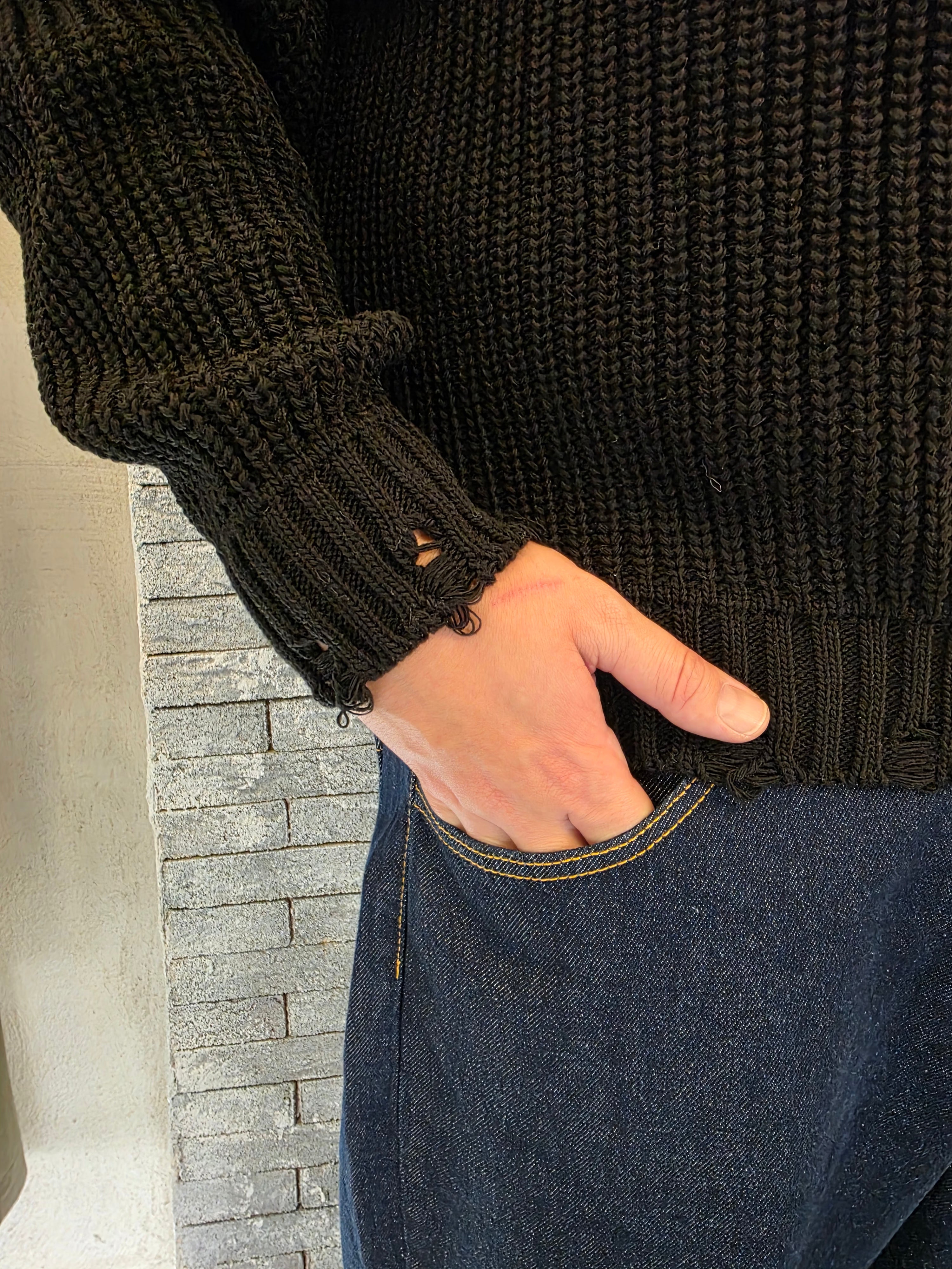 Maglione con rotture