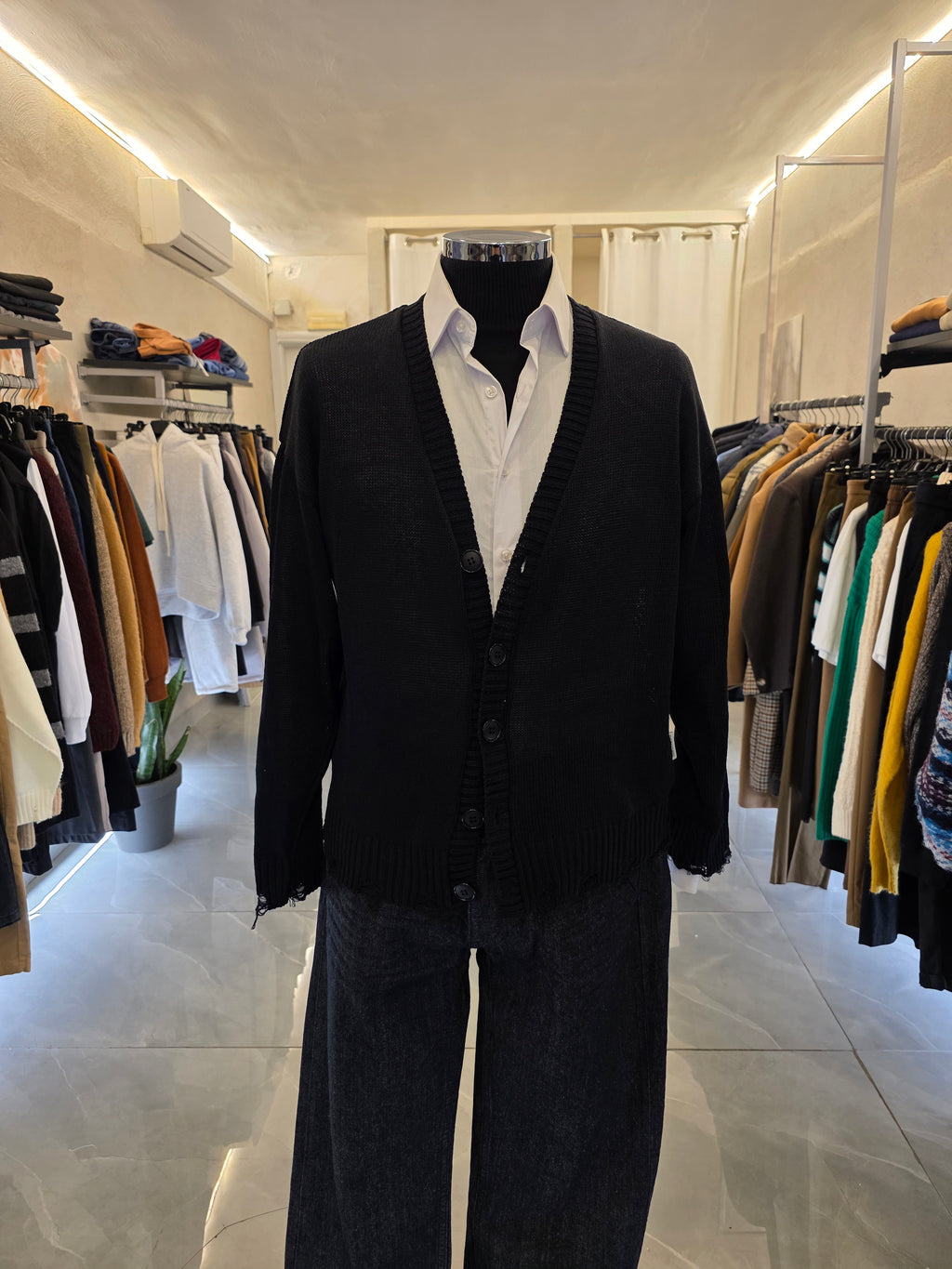 Cardigan con rotture