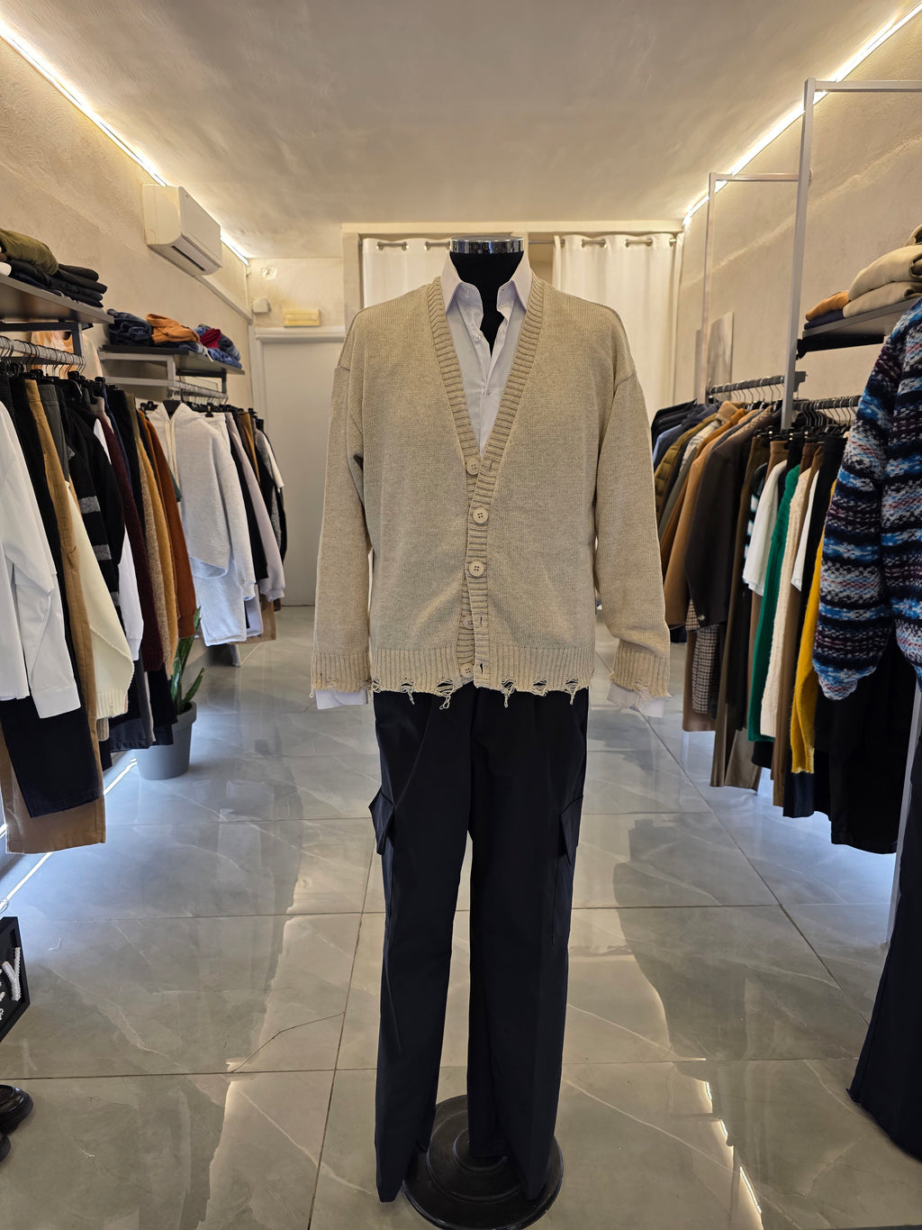 Cardigan con rotture