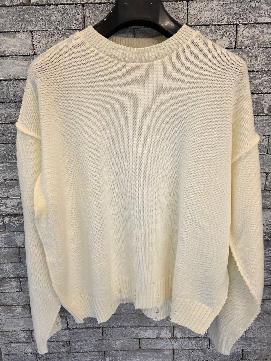 Maglione con rotture