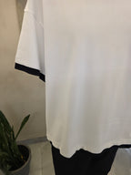 T-shirt con bordi
