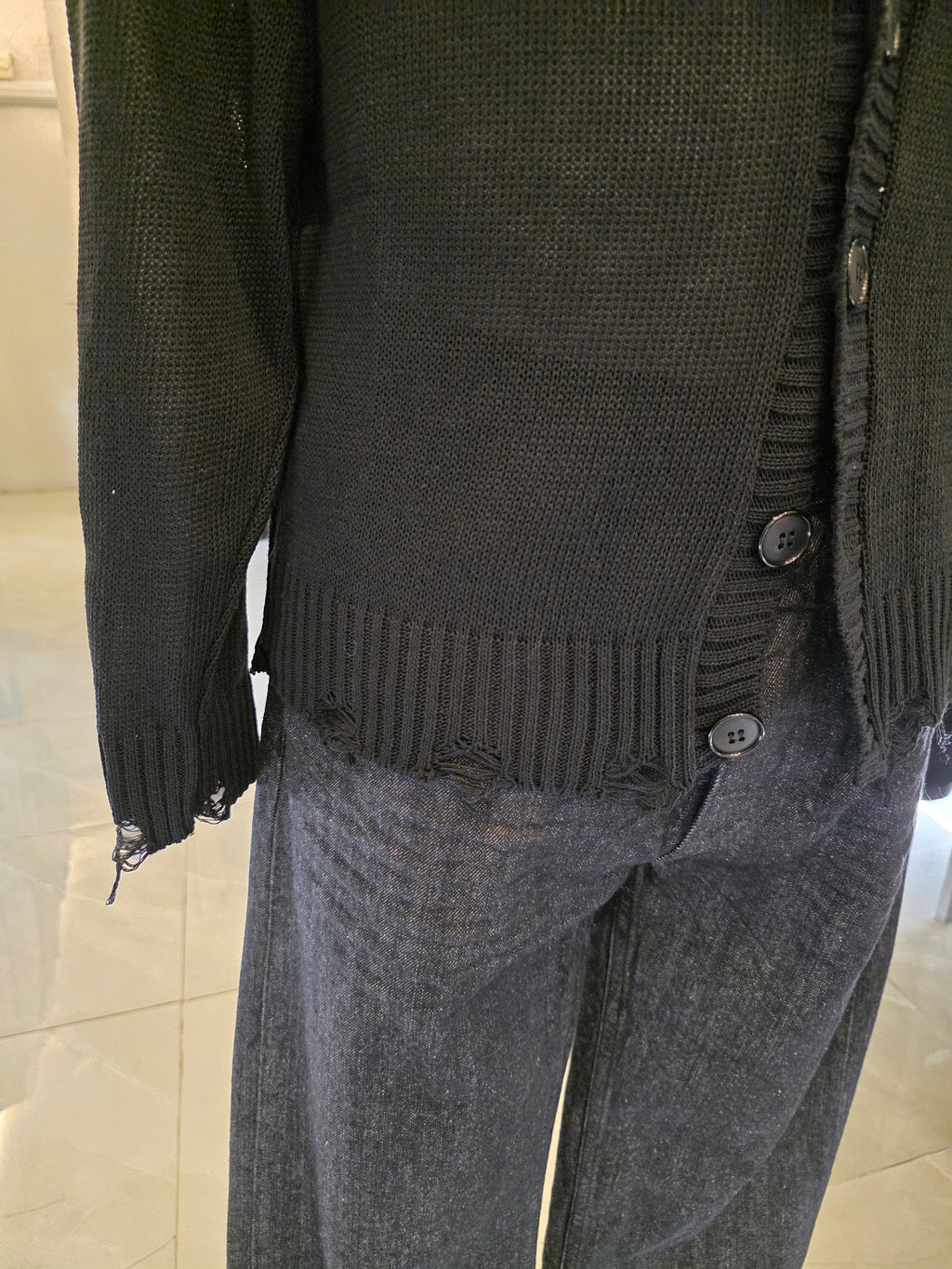 Cardigan con rotture