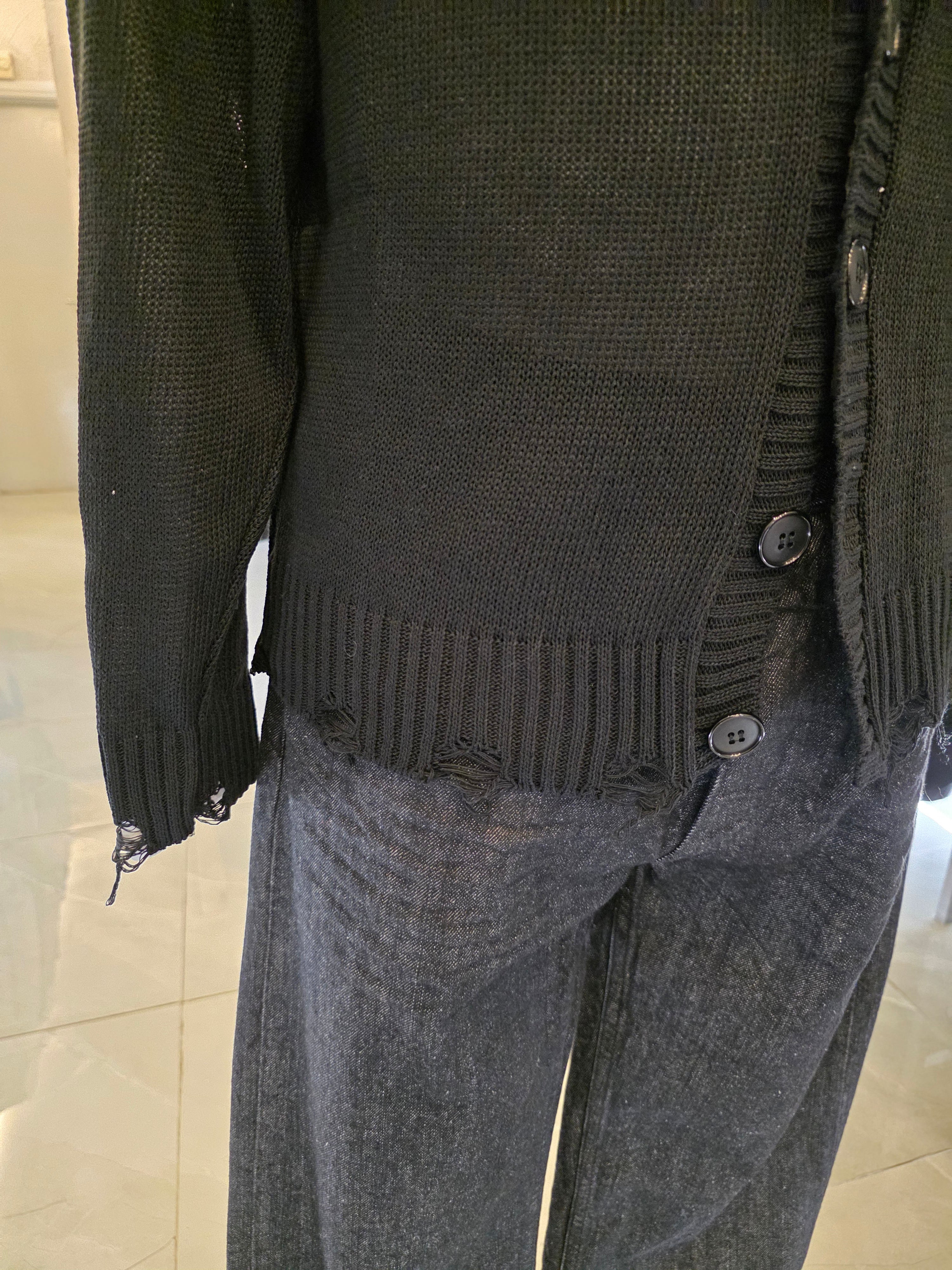 Cardigan con rotture