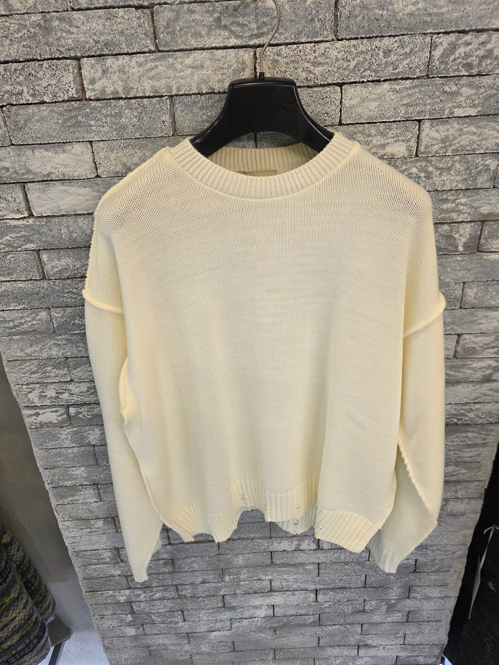 Maglione con rotture