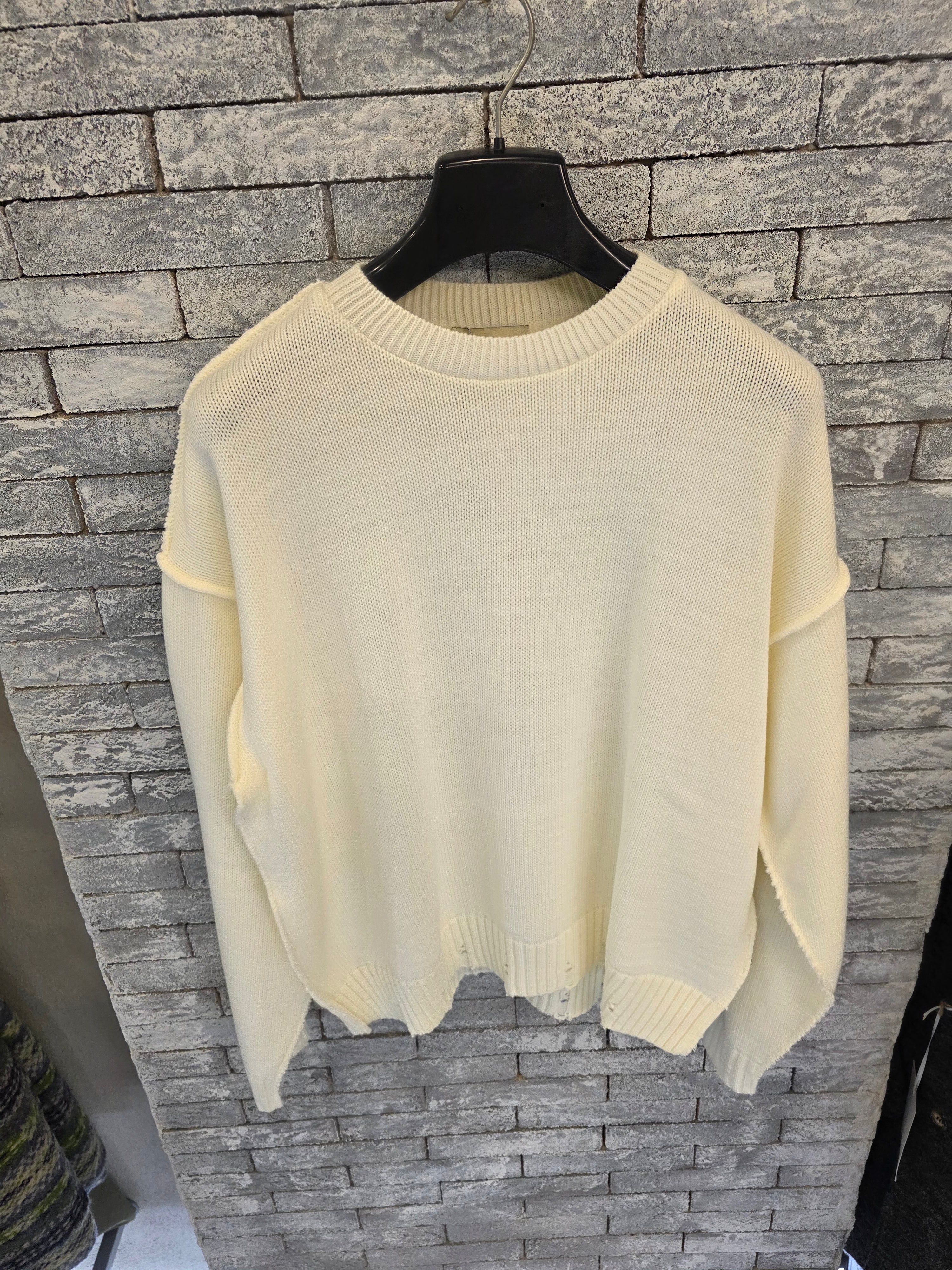 Maglione con rotture