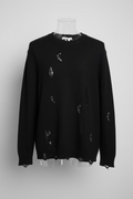 Maglione con rotture