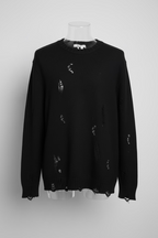 Maglione con rotture